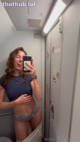 Stella Gray Strips and Fingers Herself in an Airplane Bathroom
